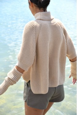 beige roll neck sweater with removable sleeves 2